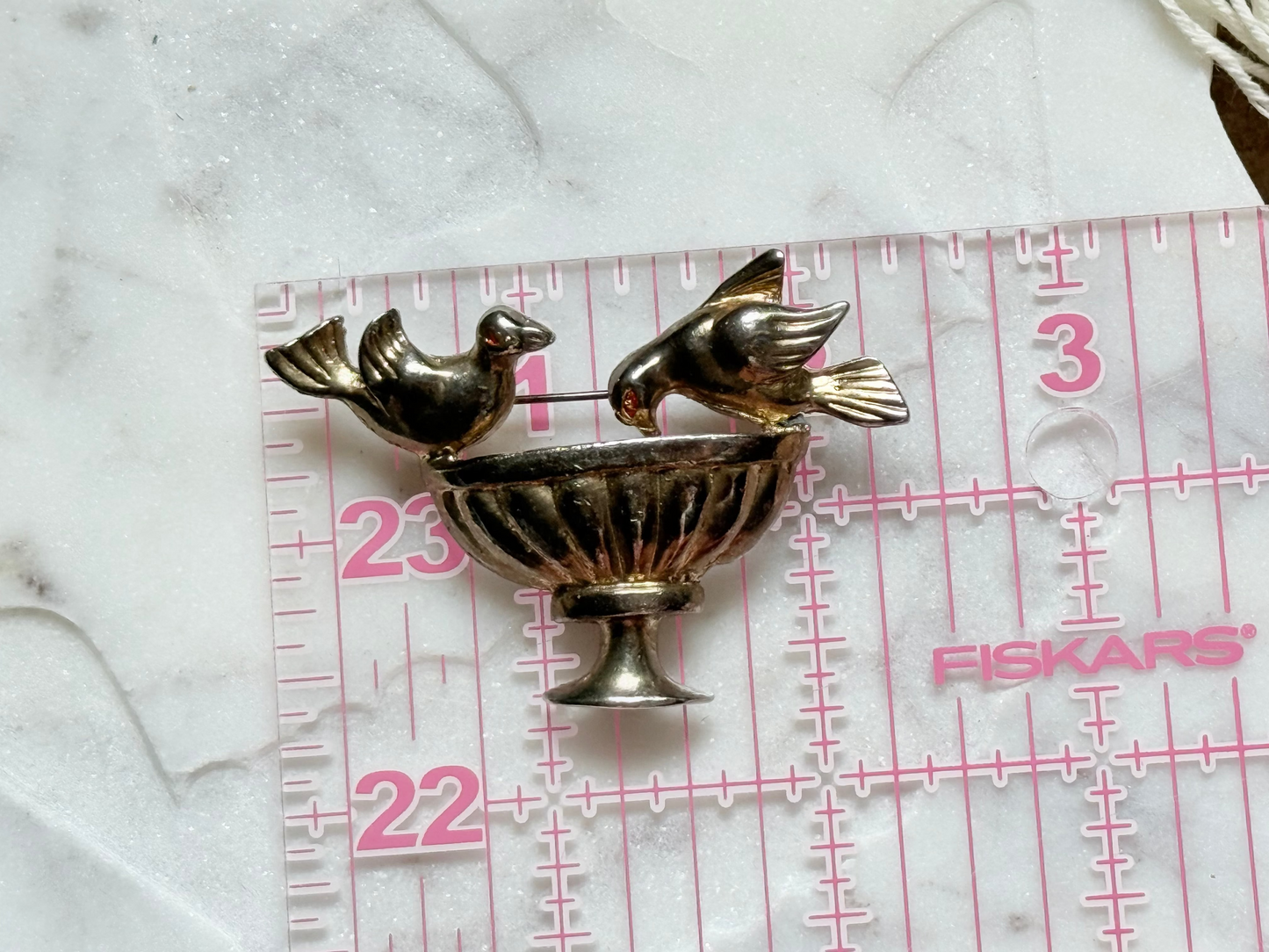 Bird brooch