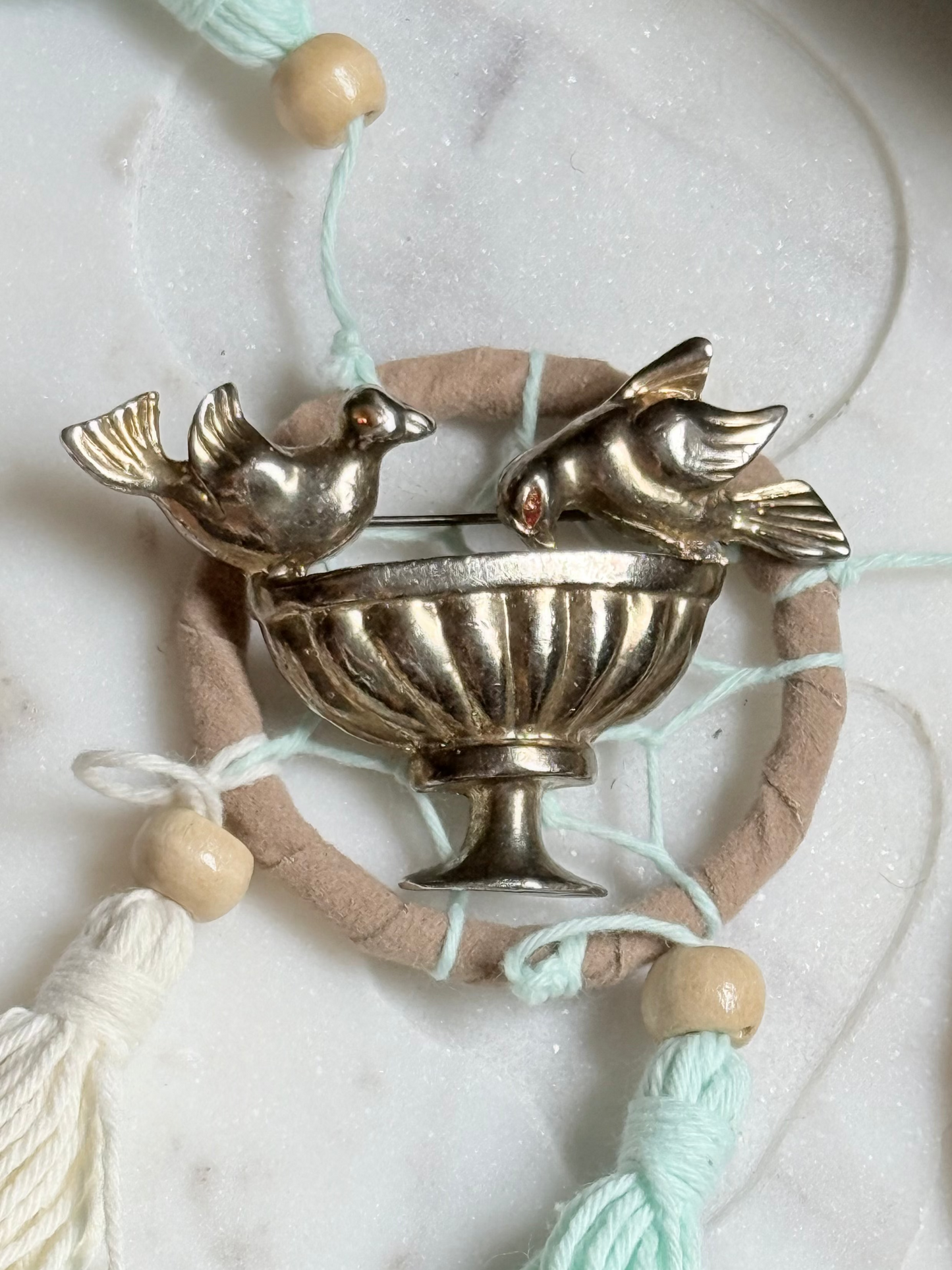 Bird brooch