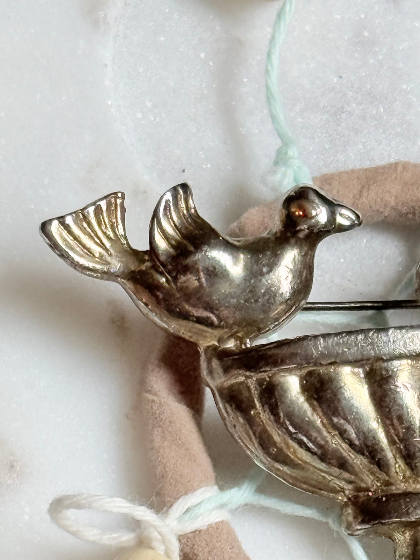 Bird brooch
