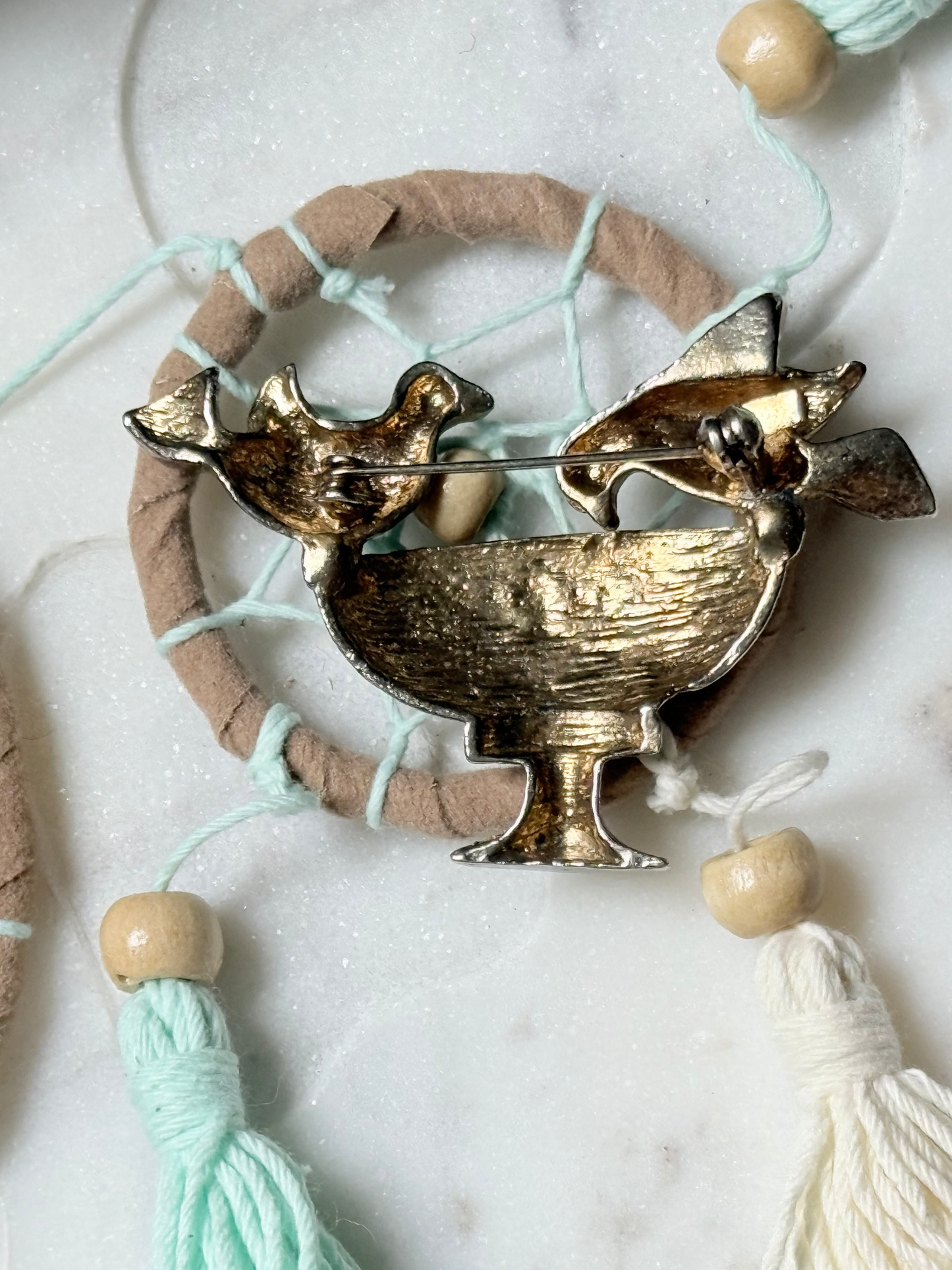 Bird brooch