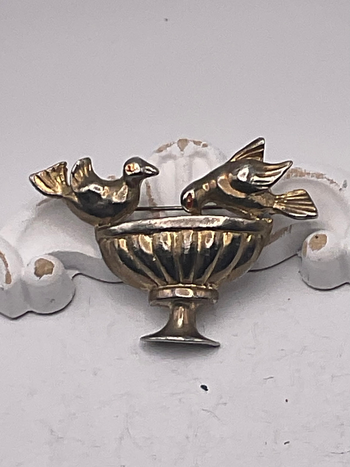 Bird brooch