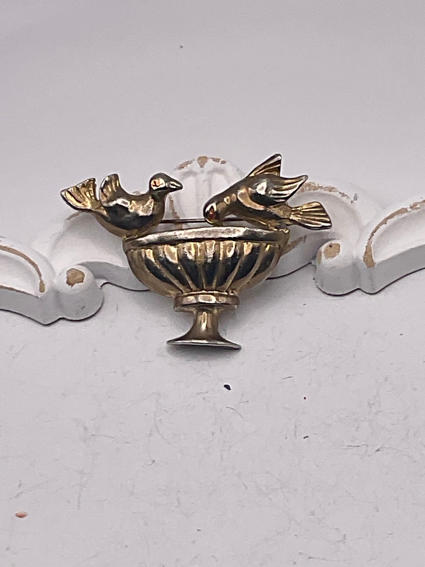 Bird brooch